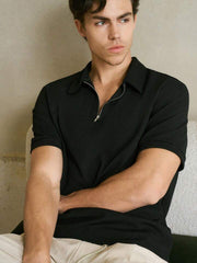 BLACK KNITTED ZIPPER POLO.